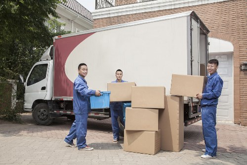 Team carrying out a safe international home removal with protective equipment